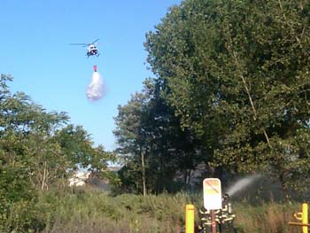 NYPD helicopter dropping on brush fire