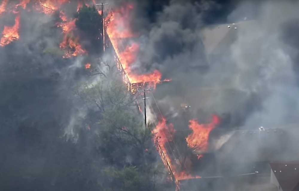 fences burn fire Texas homes destroyed